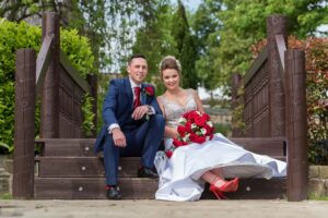 Bride with bright red shoes at Kings Croft Hotel In Pontefract