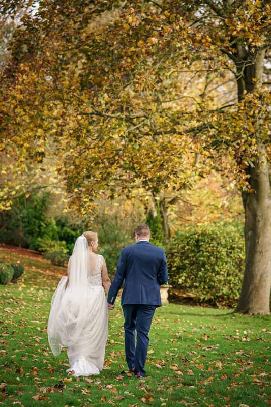 Bride and groom in autumn at Wentbridge House Hotel in Pontefract